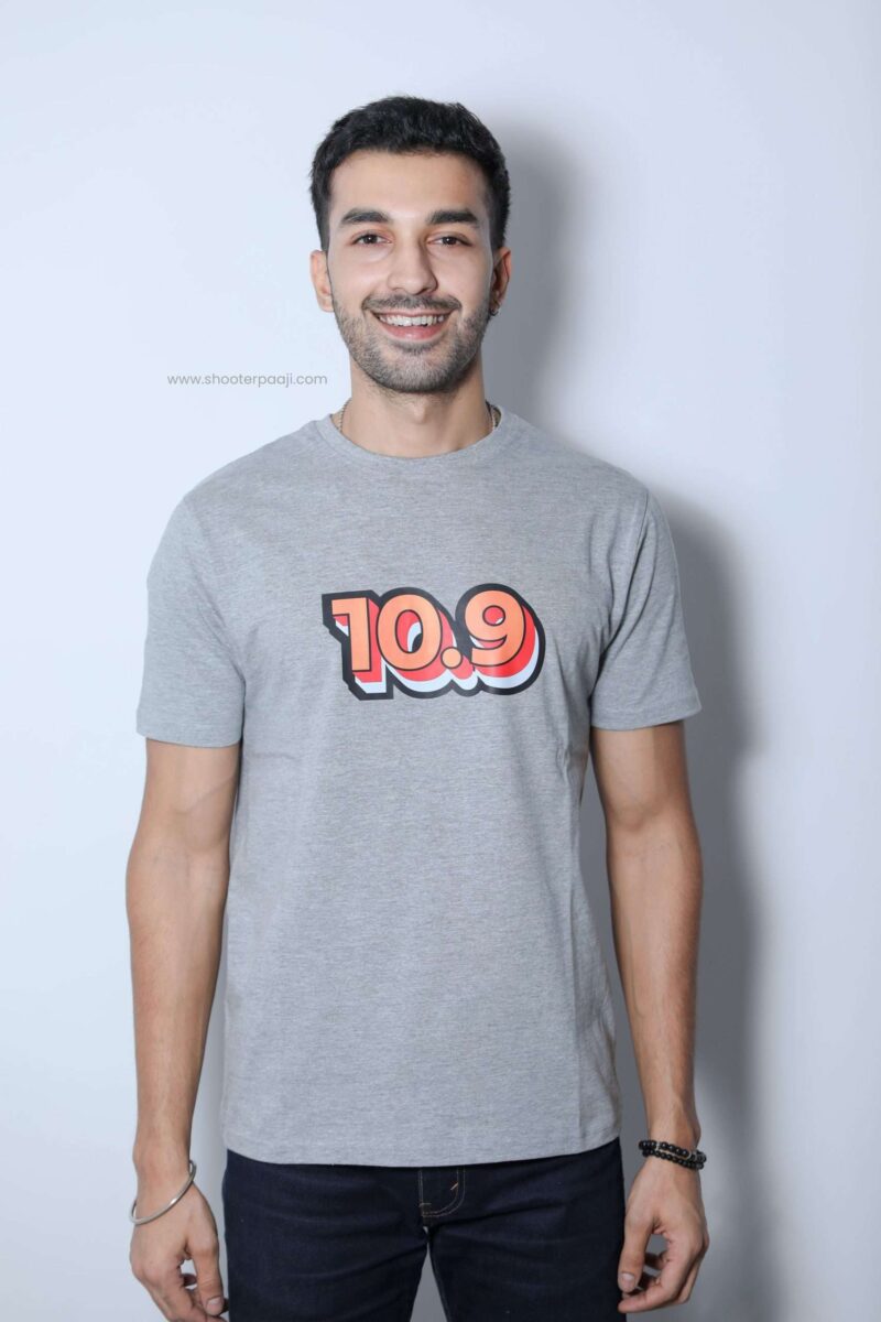10.9" T-shirt by Shooter Paaji, featuring a bold and quirky orange design on 100% cotton fabric.