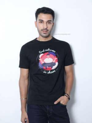 "Find Calmness in Chaos" T-shirt by Shooter Paaji, featuring motivational text printed on 100% cotton fabric.