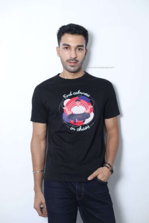 "Find Calmness in Chaos" T-shirt by Shooter Paaji, featuring motivational text printed on 100% cotton fabric.